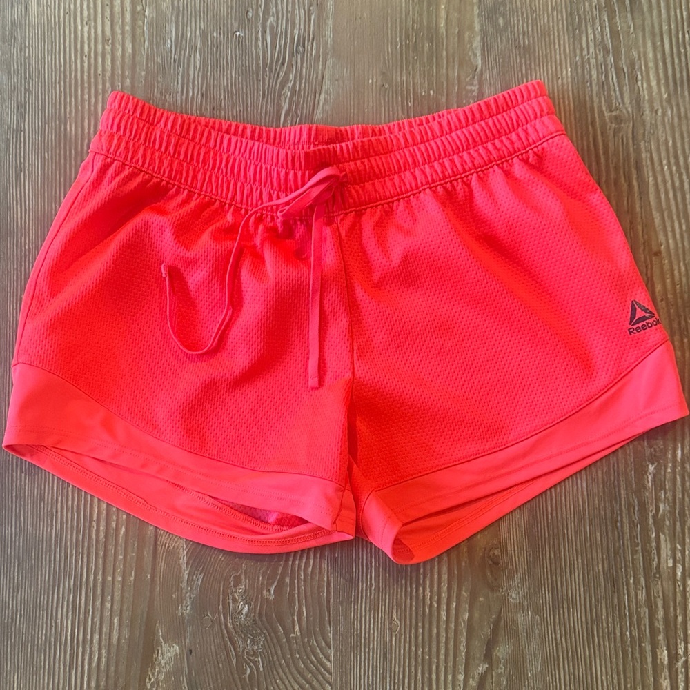 Reebok Women's Vibrant orange Athletic Shorts